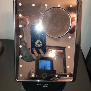 Small light up vanity mirror